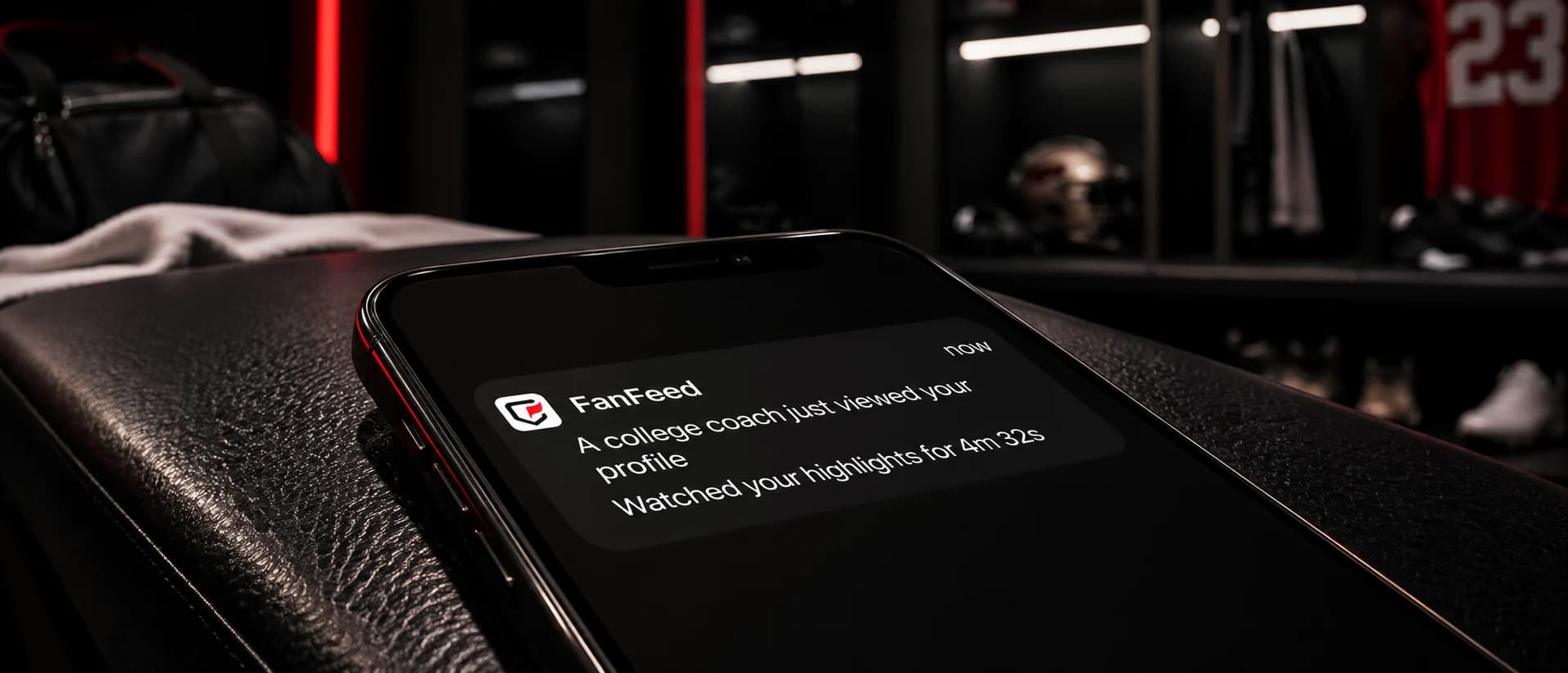A college coach just viewed your profile — push notification on a phone resting on a locker-room bench